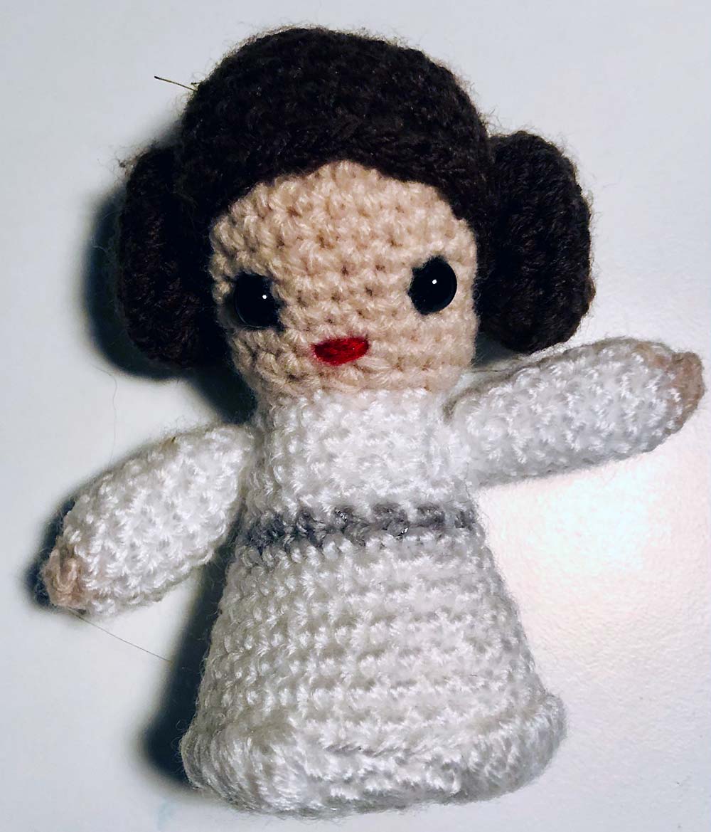 A crocheted Princess Leia doll