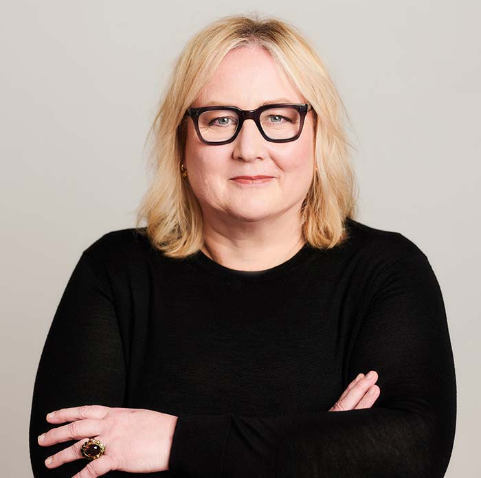 Sarah Taylor Hawke with her arms folded