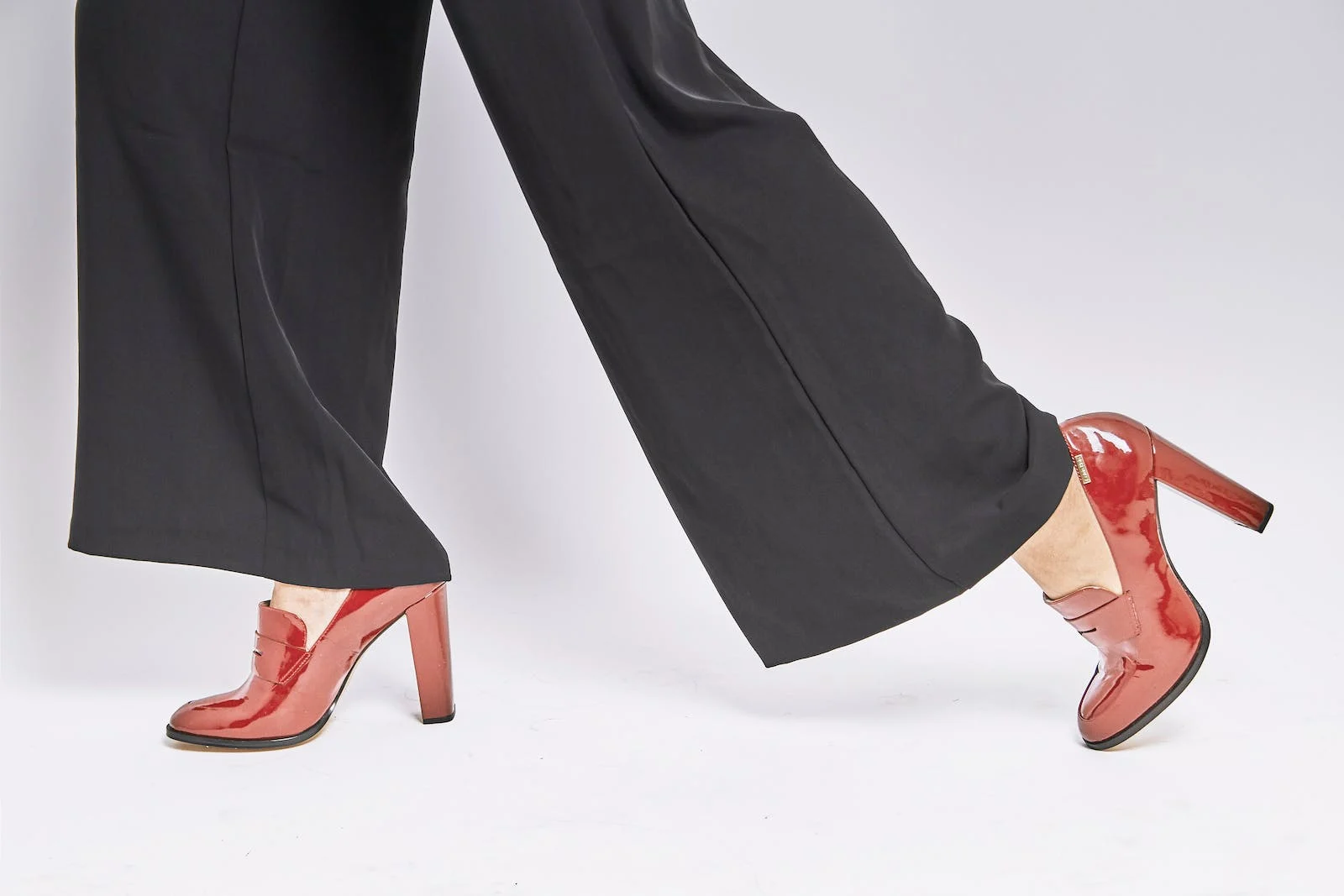 A pair of shoes on a wooden floor